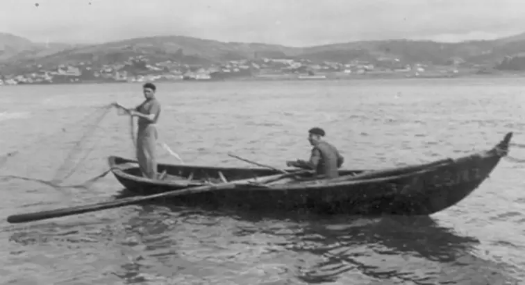 Dois pescadores num barco
